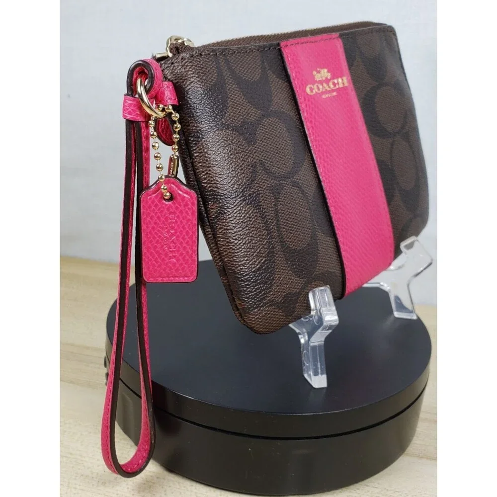 COACH Corner Zip Wristlet In Dark Brown Signature Leather w/ Hot Pink Stripe